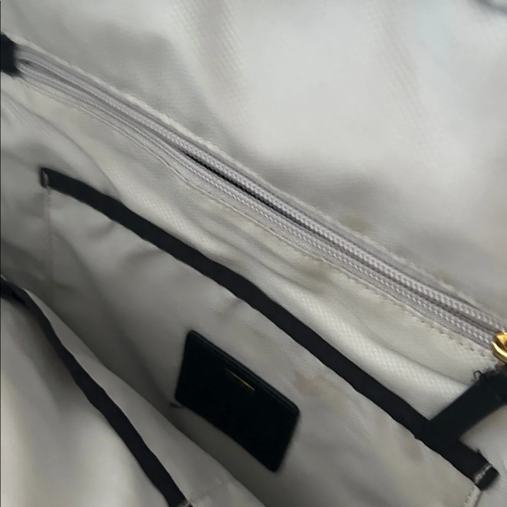 Tumi Black Backpack with Gold Hardware